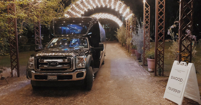 Swoop Bus under lights at wedding venue