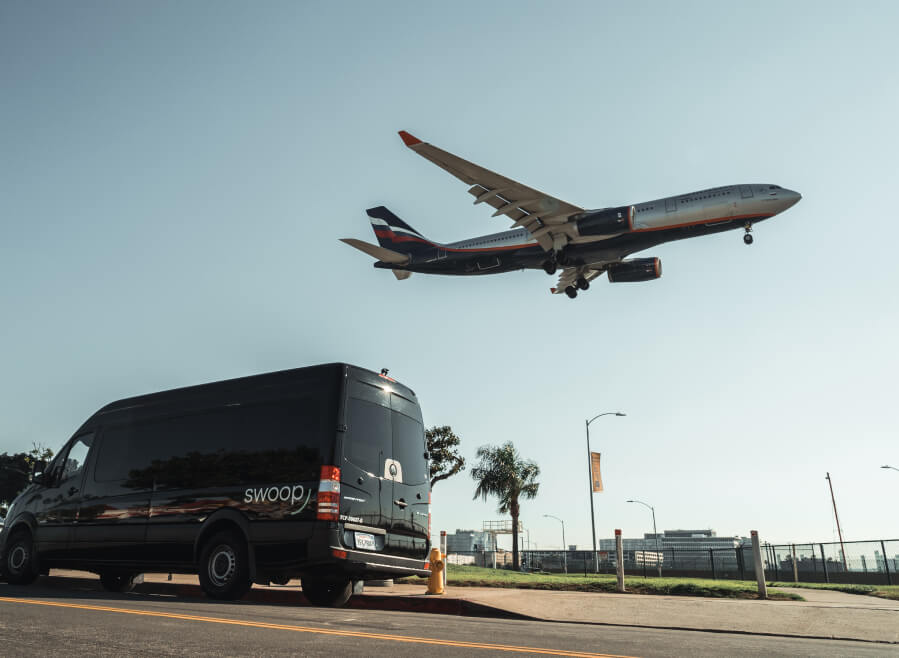 Swoop corporate shuttle with a flying airplane